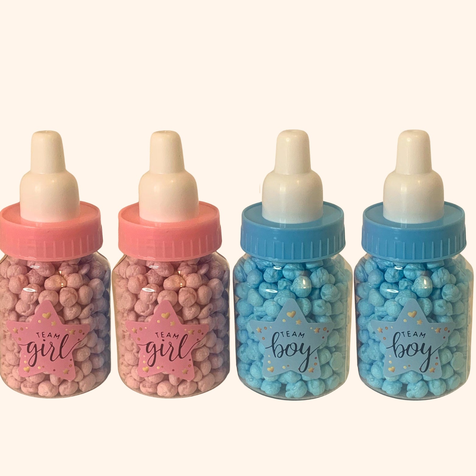 Candy Reveal Flesjes voor gender reveal party - babyflesjes met blauwe en roze snoepjes Team Blauw en Team Roze
